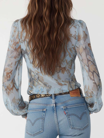 Marina · Blouse froncée avec fermeture éclair dorée