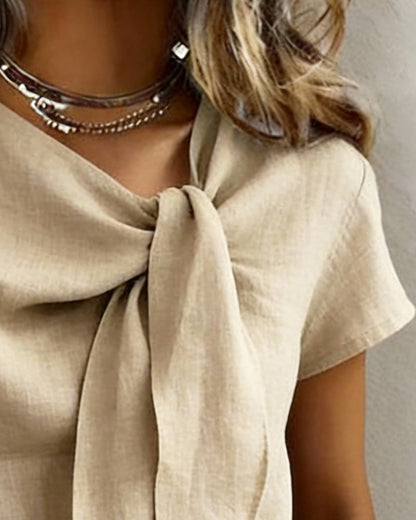 Valentina · Blouse légère avec col en V et nœud