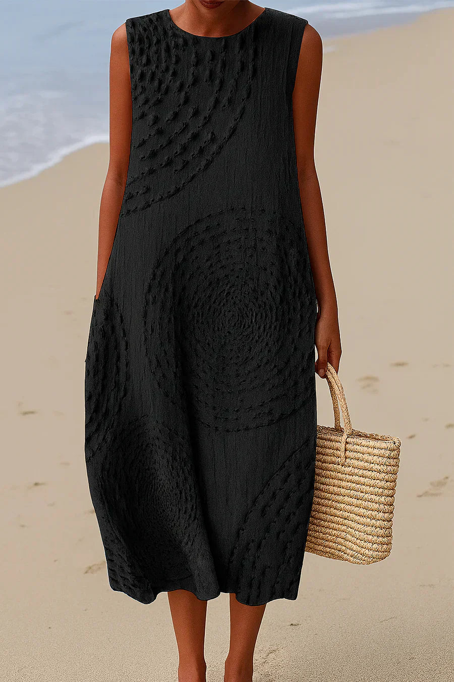 Jeanne · Robe fluide minimaliste à détails texturés