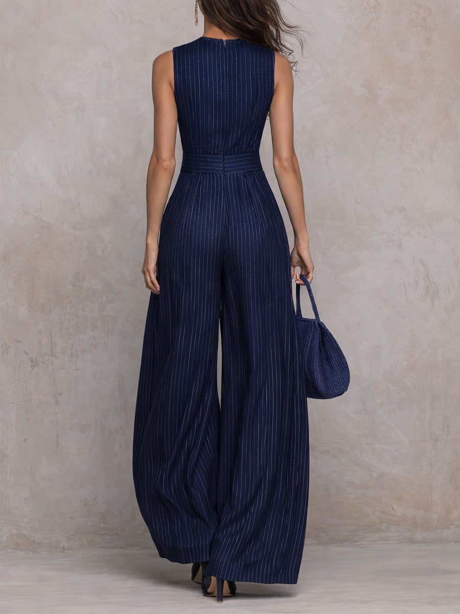 Anna - Mono bleu foncé à rayures avec décolleté en forme de clé et pantalon à jambes larges