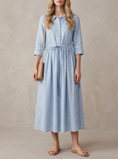 Marguerite · Robe midi bleue col claudine et lacet à la taille