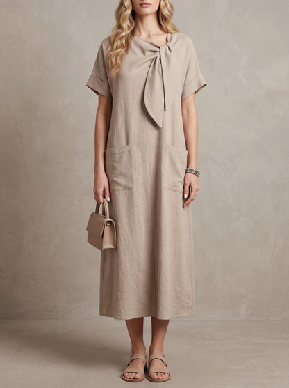 Paulette · Robe maxi nœud au col avec poches