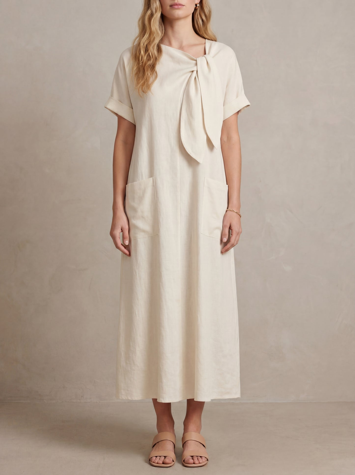 Paulette · Robe maxi nœud au col avec poches