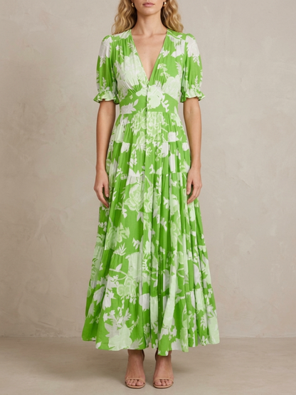 Thérèse · Robe maxi fleurie col V profond, coupe évasée et poches