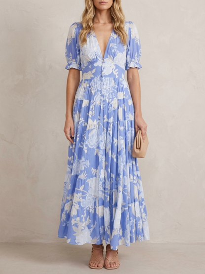 Thérèse · Robe maxi fleurie col V profond, coupe évasée et poches