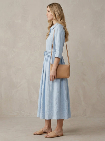 Marguerite · Robe midi bleue col claudine et lacet à la taille